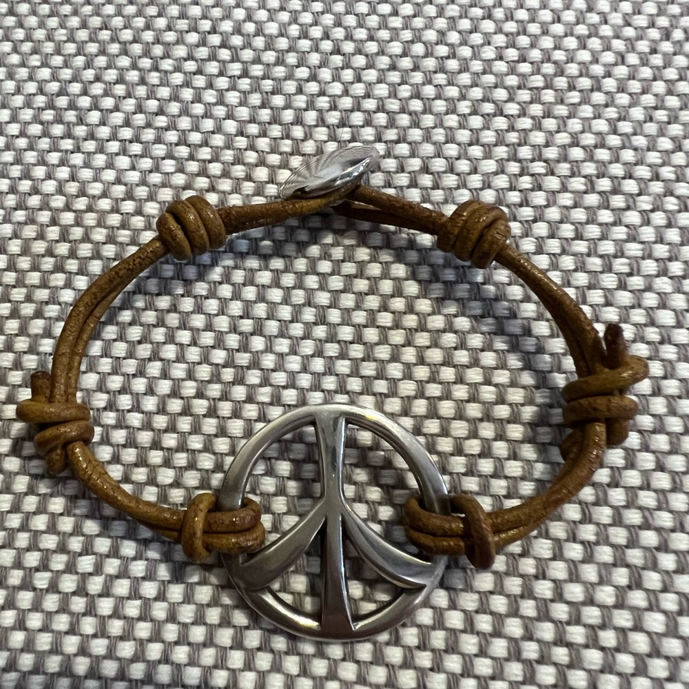 Retired leather peace bracelet